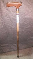 Wooden cane 33 in tall with some scratches and