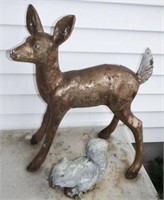 Cute concrete baby fawn deer