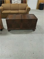 Coffee table with hidden storage