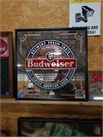 Large Budweiser mirror sign.