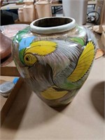 Colorful peacock vase.