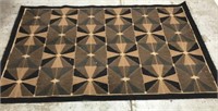 Black and brown area rug