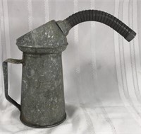 Old galvanized oil can