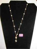 32) 18KT Yellow Gold necklace w/  Black Tahitian