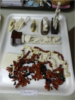 TRAY: CARVED FIGURES, NECKLACE, ETC.