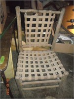 Log/stick chair with canvas straps
