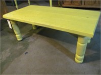 Yellow painted coffee table