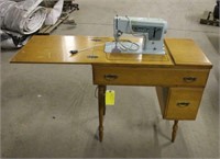 Singer Sewing Machine in Cabinet