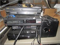 Various electronics including VHS, DVD player,