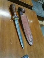 Knife with engraved blade and sheath