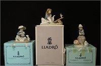 Thee large Lladro porcelain statues with boxes