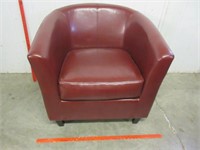 nice maroon club chair (partially leather)