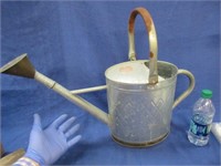 vintage watering can (has copper end)