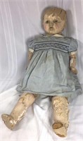Creepy antique doll