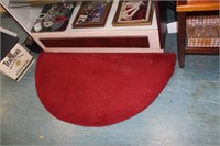 Red hearth rug.