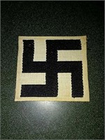 A swastika on small piece of material