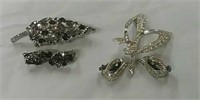 Brooches and earrings