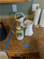 Teapots And Water And Can As Shown