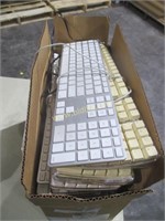 Box of Apple Keyboards