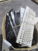 Box of Keyboards, Cords, and Headphones
