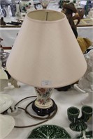 Floral ceramic lamp with shade.
