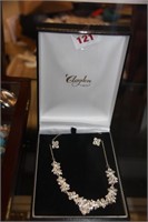 Boxed 'Clayden' diamante necklace and ear rings.