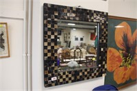 Mosaic tiled mirror.