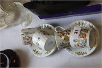 Four Ainsley coffee cups and saucers