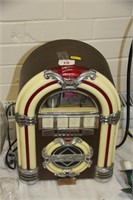 Radio & cassette player in form vintage jukebox.