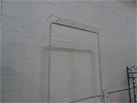 Clothes rack with upper shelf