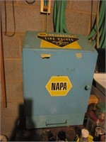 Advertisement cabinet for Napa Auto Parts full of