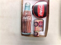 Empty Coca Cola Tins and Lunch Box
