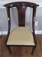 Cherry side chair with upholstered seat. Note: