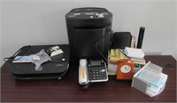 Large assortment of office items that includes