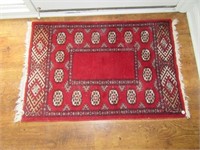 39" x 25" oriental rug.