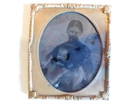 Mother and child daguerreotype in foil frame,