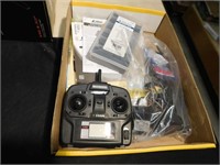Box of misc. airplane parts and chargers