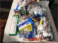 Box of batteries and chargers for Styrofoam