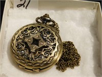Pocket watch w/see thru case and visible workings