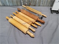 Wooden rolling pins (6), one glass rolling pin