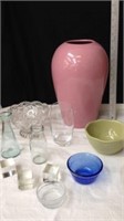 Large pink ceramic vase with blue Pyrex bowl