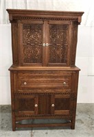 Antique carved oak china cabinet