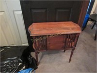 Pretty carved table with door