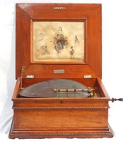 Regina music box in oak case - 19th cent.