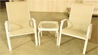 Pair of white metal chairs and glass top patio