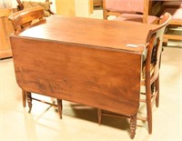 Antique Mahogany drop leaf table with carved