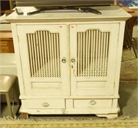 Primitive style two door over two drawer