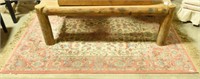 Floral wool pile area rug (52” x 74”)