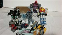 Several Transformers and sticker book