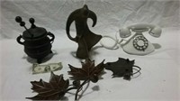 Metal sculpture, metal kettle, telephone and